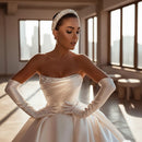 Satin strapless bridal gown with a classic elegant silhouette
