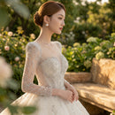 Cotton wedding dress with elegant train silhouette