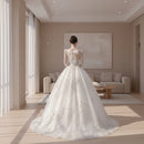 Cotton wedding dress with elegant train silhouette