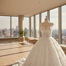 Elegant vintage lace bridal gown with graceful puff skirt silhouette