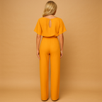 High-waist jumpsuit for women with lace-up detail and flattering fit, perfect for work, evenings out, and chic occasions.