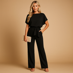 High-waist jumpsuit for women with lace-up detail and flattering fit, perfect for work, evenings out, and chic occasions.
