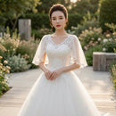 One shoulder lace wedding dress with elegant bridal styling