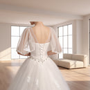 One shoulder lace wedding dress with elegant bridal styling