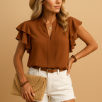 Sleeveless elegant blouse for women with tailored fit and refined design, perfect for work, casual wear, and evening occasions.