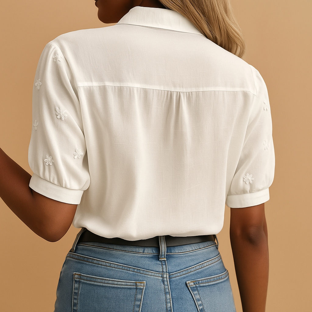 White elegant blouse for women with tailored fit and classic collar, perfect for work, casual days, and evening occasions.