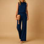Wide-leg elegant jumpsuit for women with round neckline and mid-waist fit, perfect for work, evening wear, and special occasions.